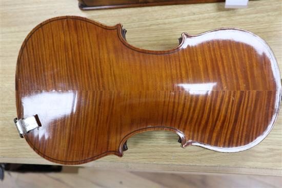 A ate 19th century German violin labelled Heinrich Schwartz Leipzig 1894 cased with a bow